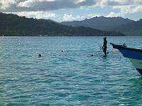 Guide's standing on a piece of coral...